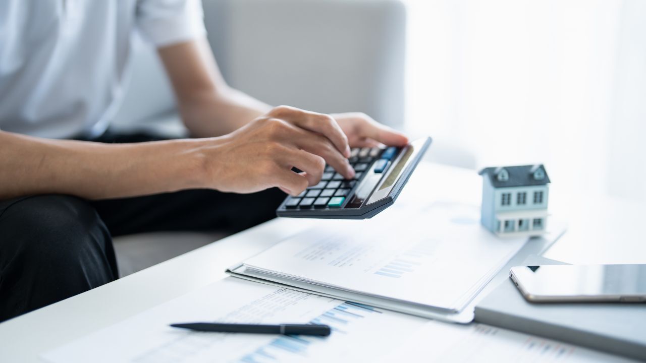 A%20person%20using%20a%20calculator
